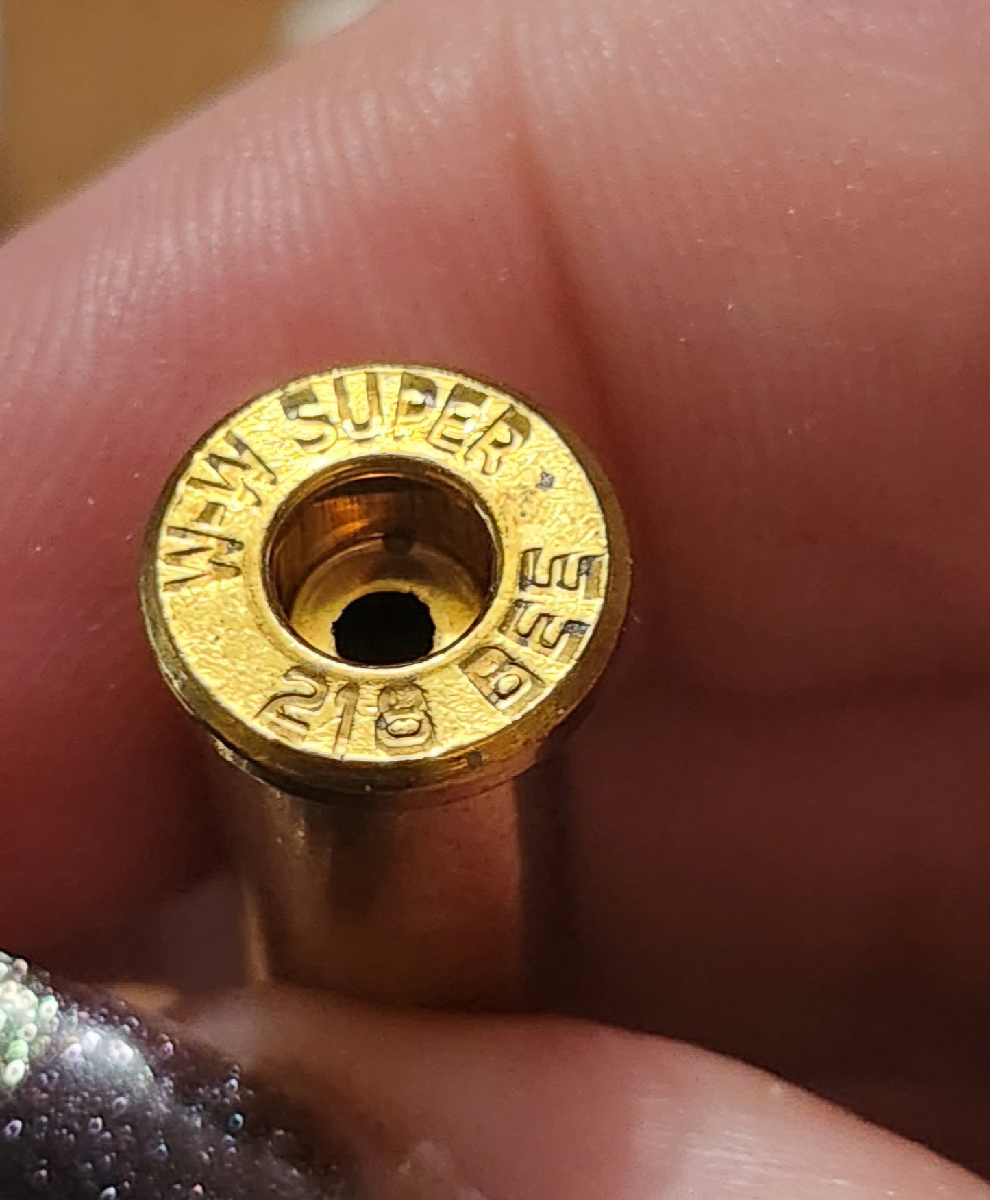 218 Bee brass